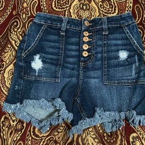 High rise NO BOUNDARIES cut off shorts already store bought that way.